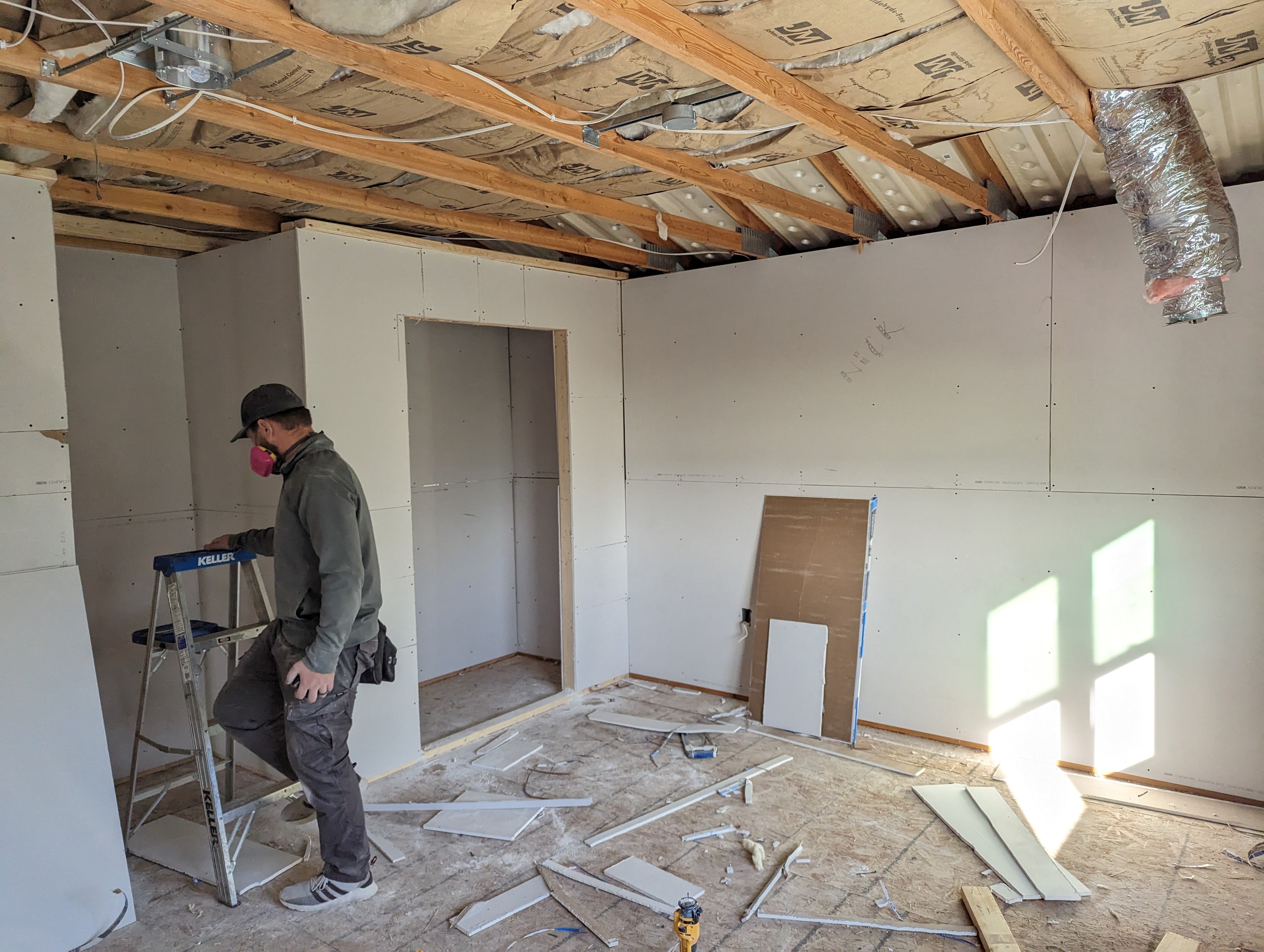 Drywall installation in progress