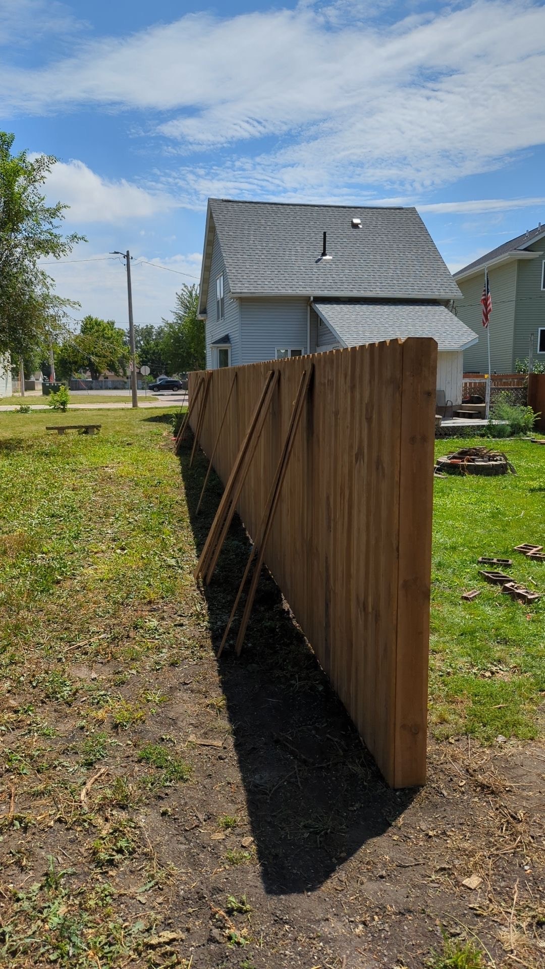 Fence materials staged — ready for install