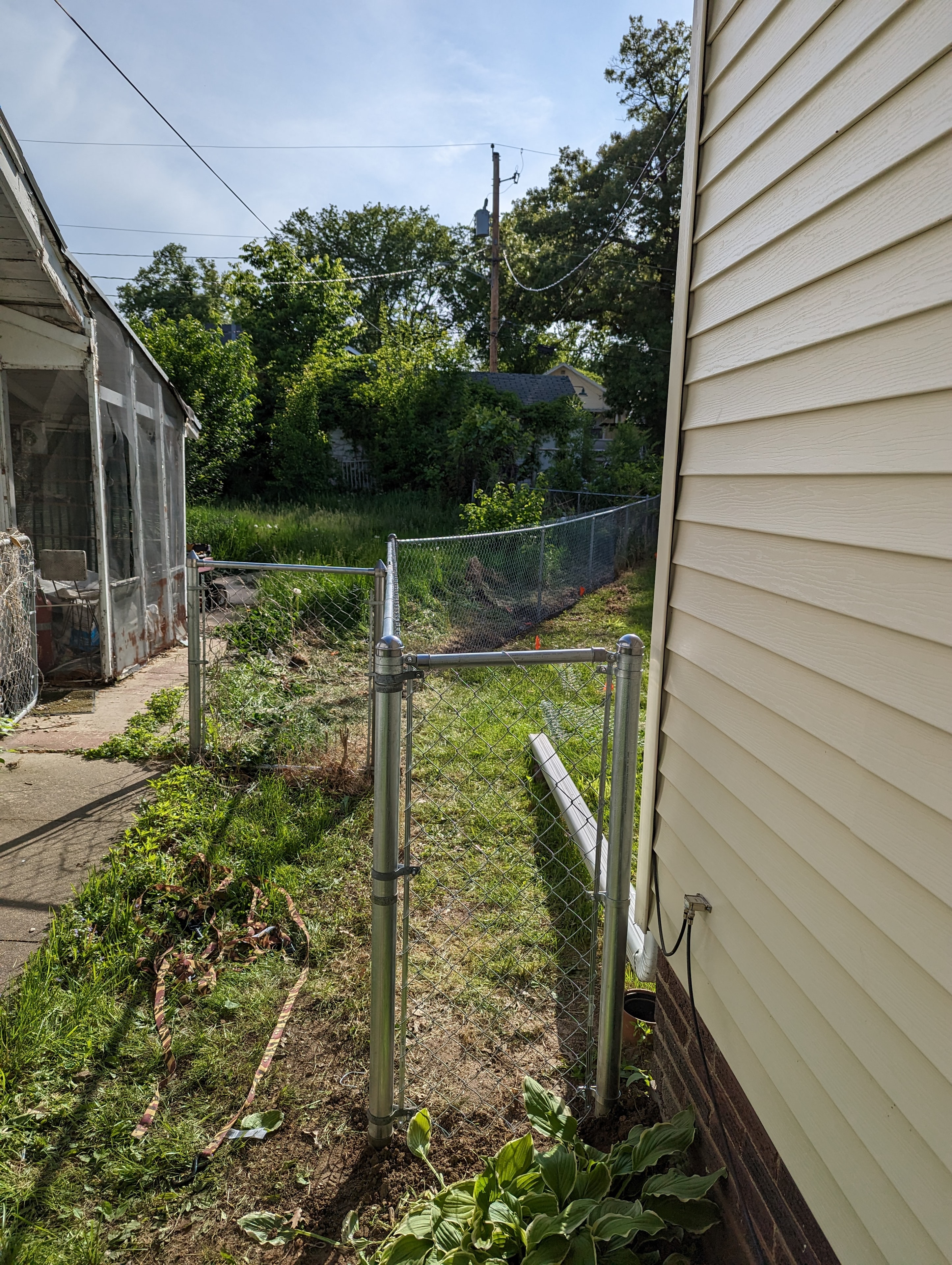 Chain-link gate — existing fence work