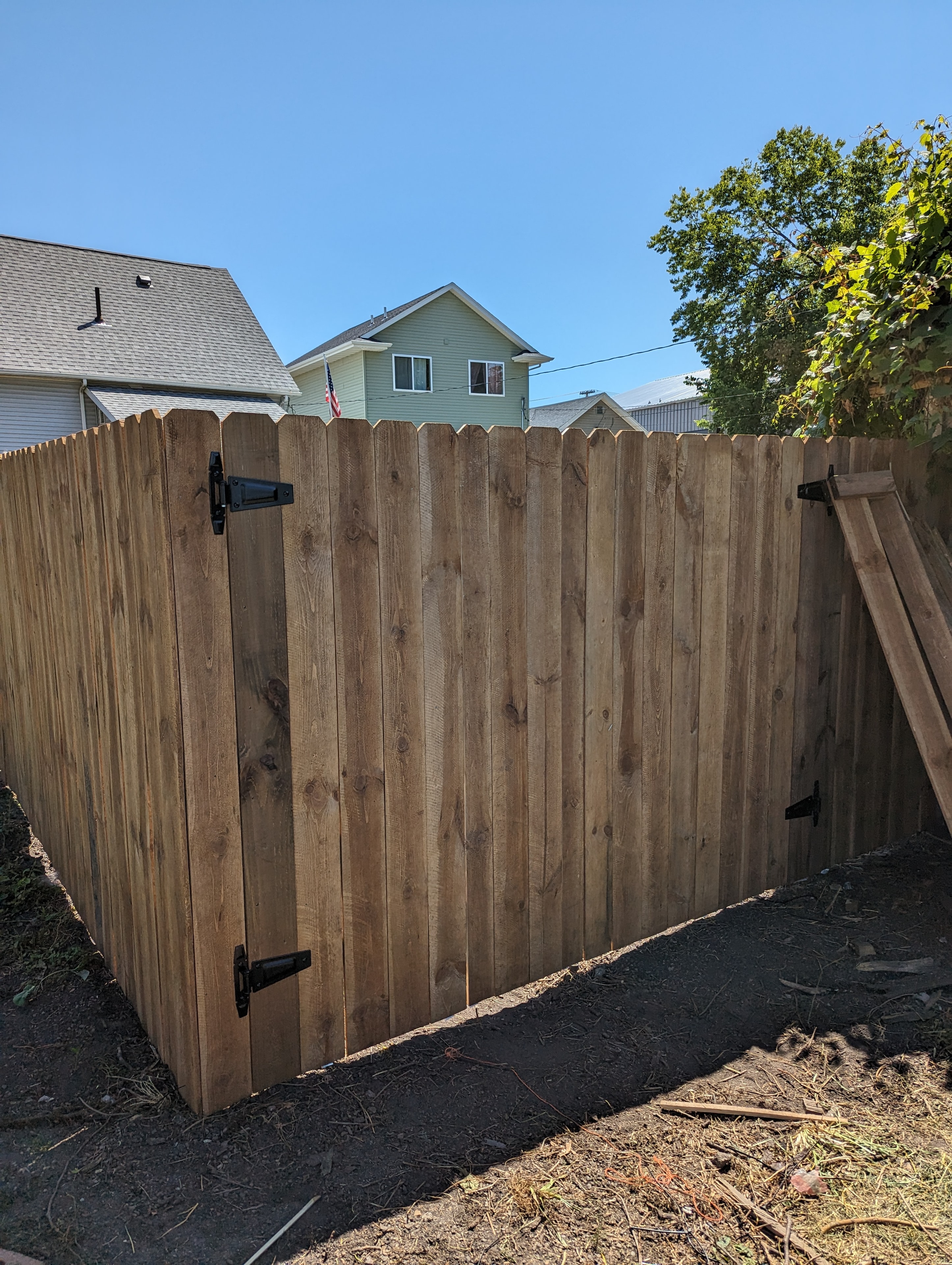 Completed wood fence with gate