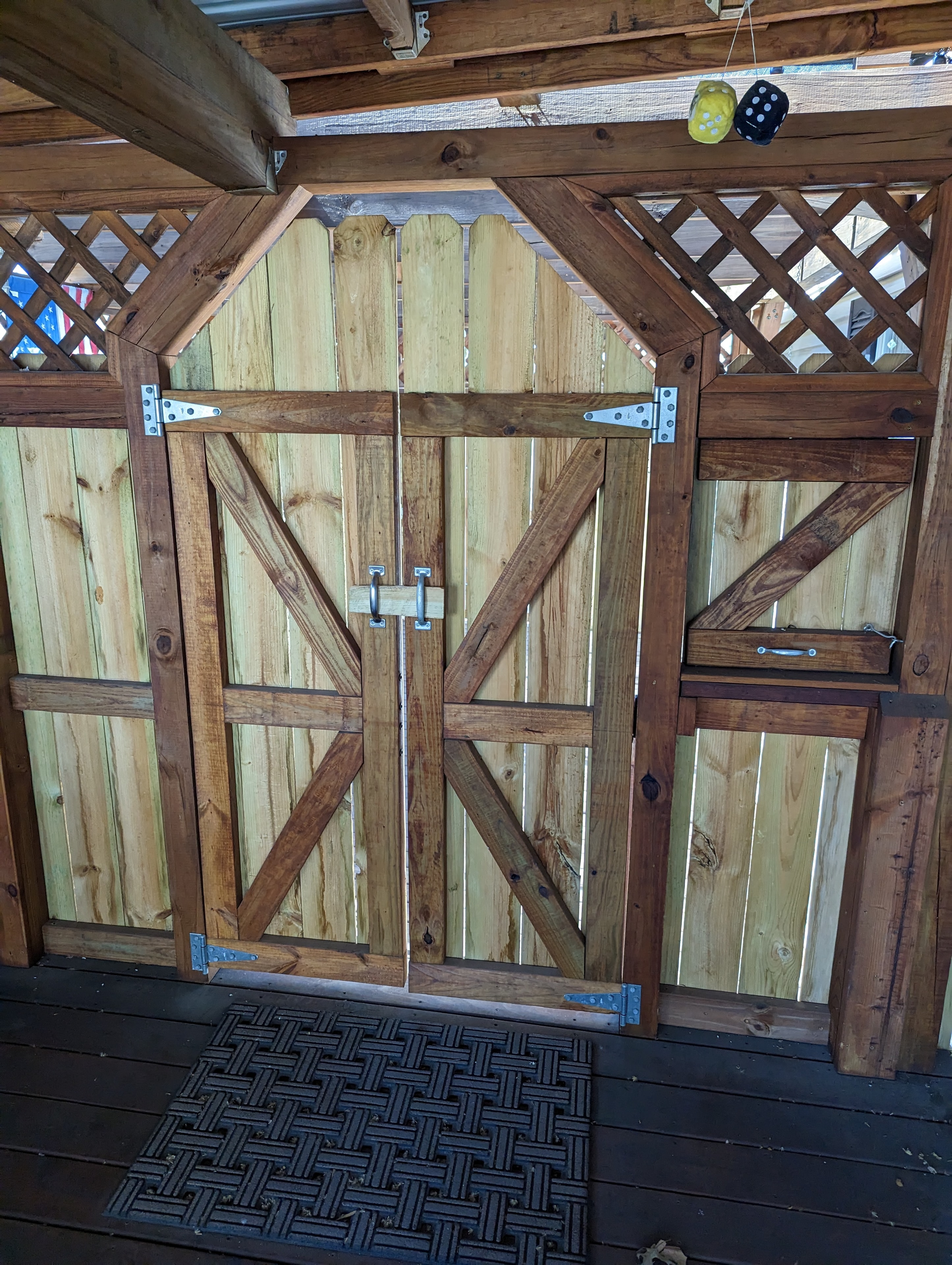 Custom barn-style double doors with lattice