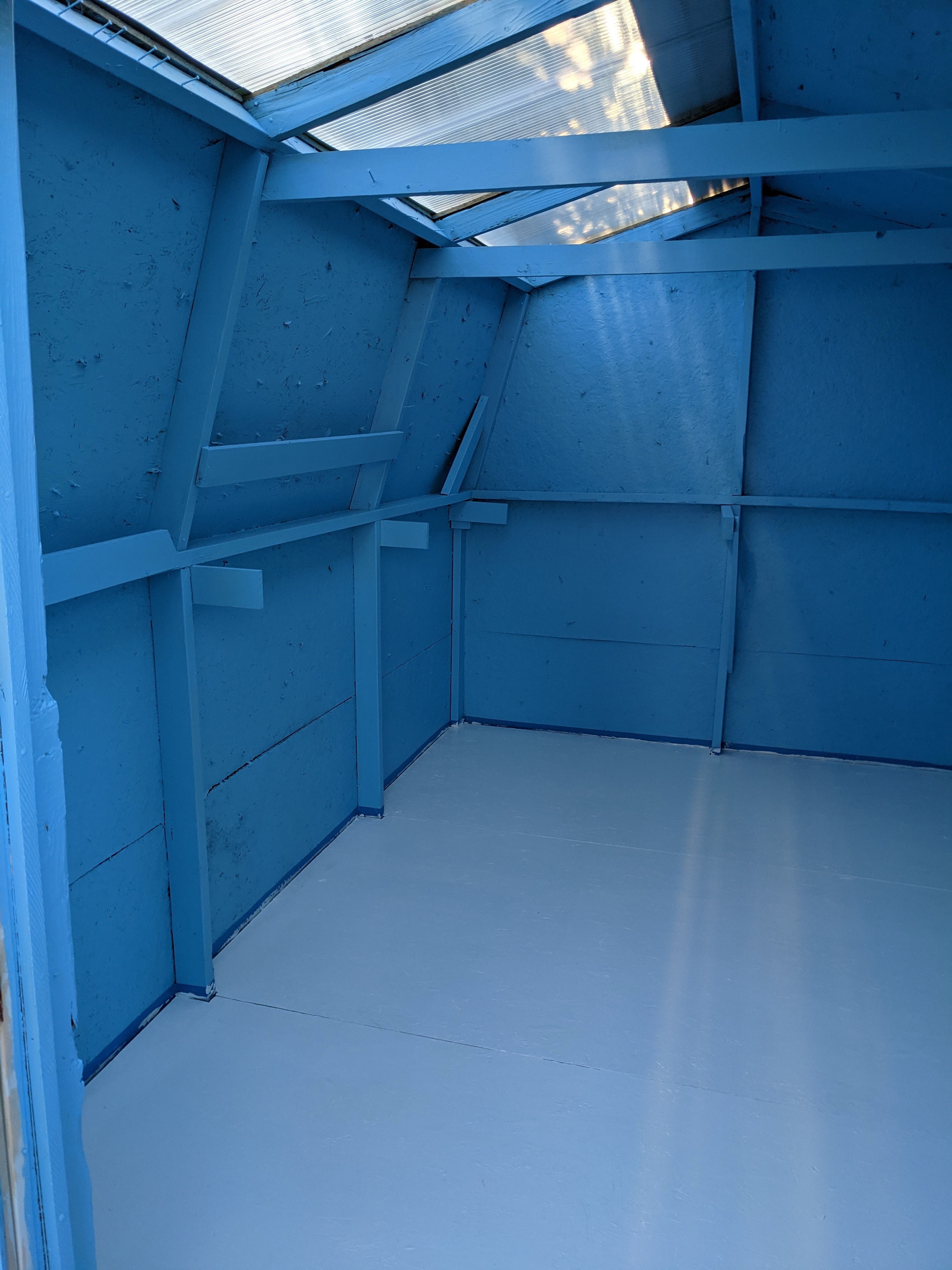 Shed conversion — half the roof opened up as a custom sunroof