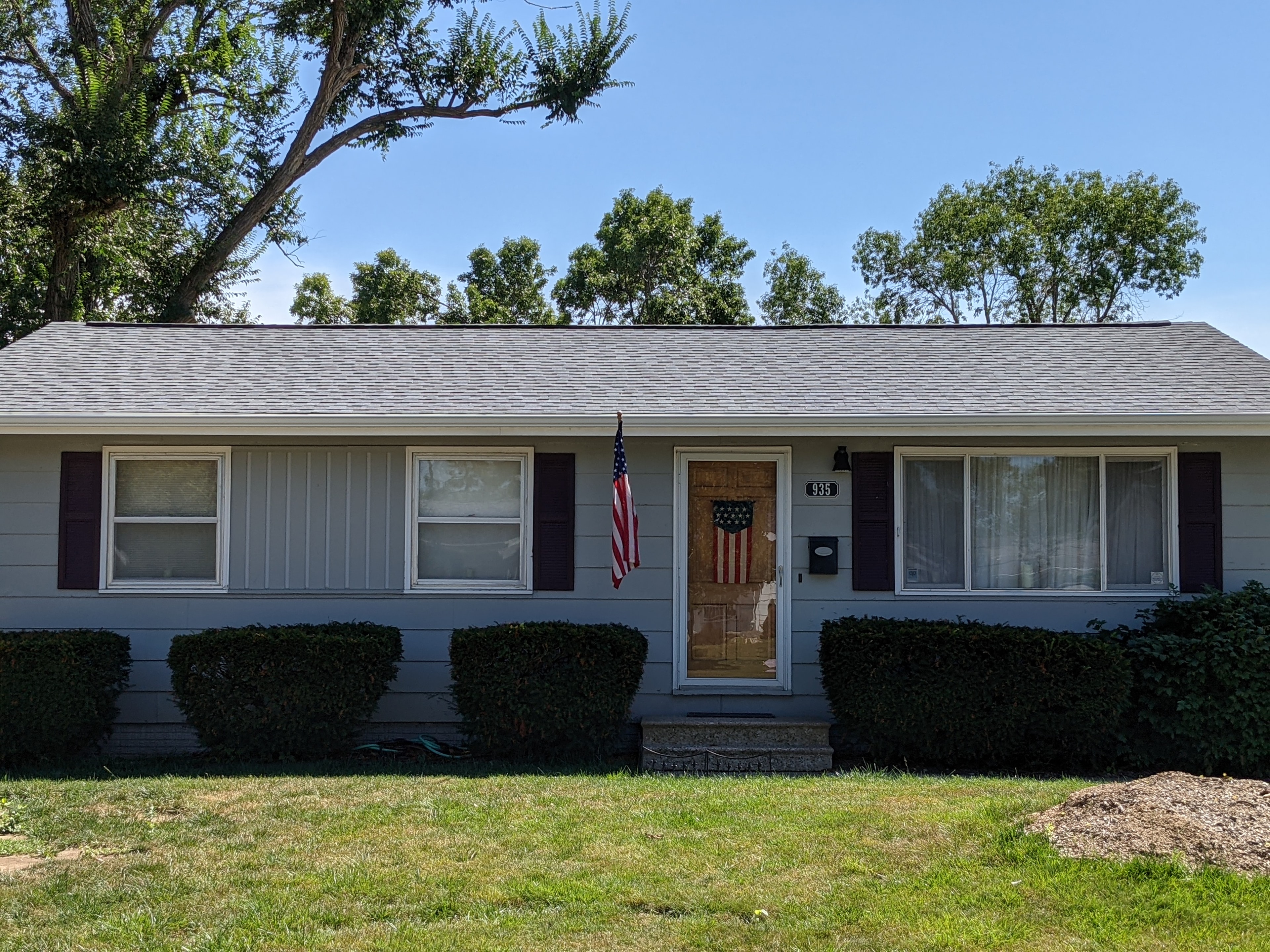 Completed residential roof — ranch home with new shingles