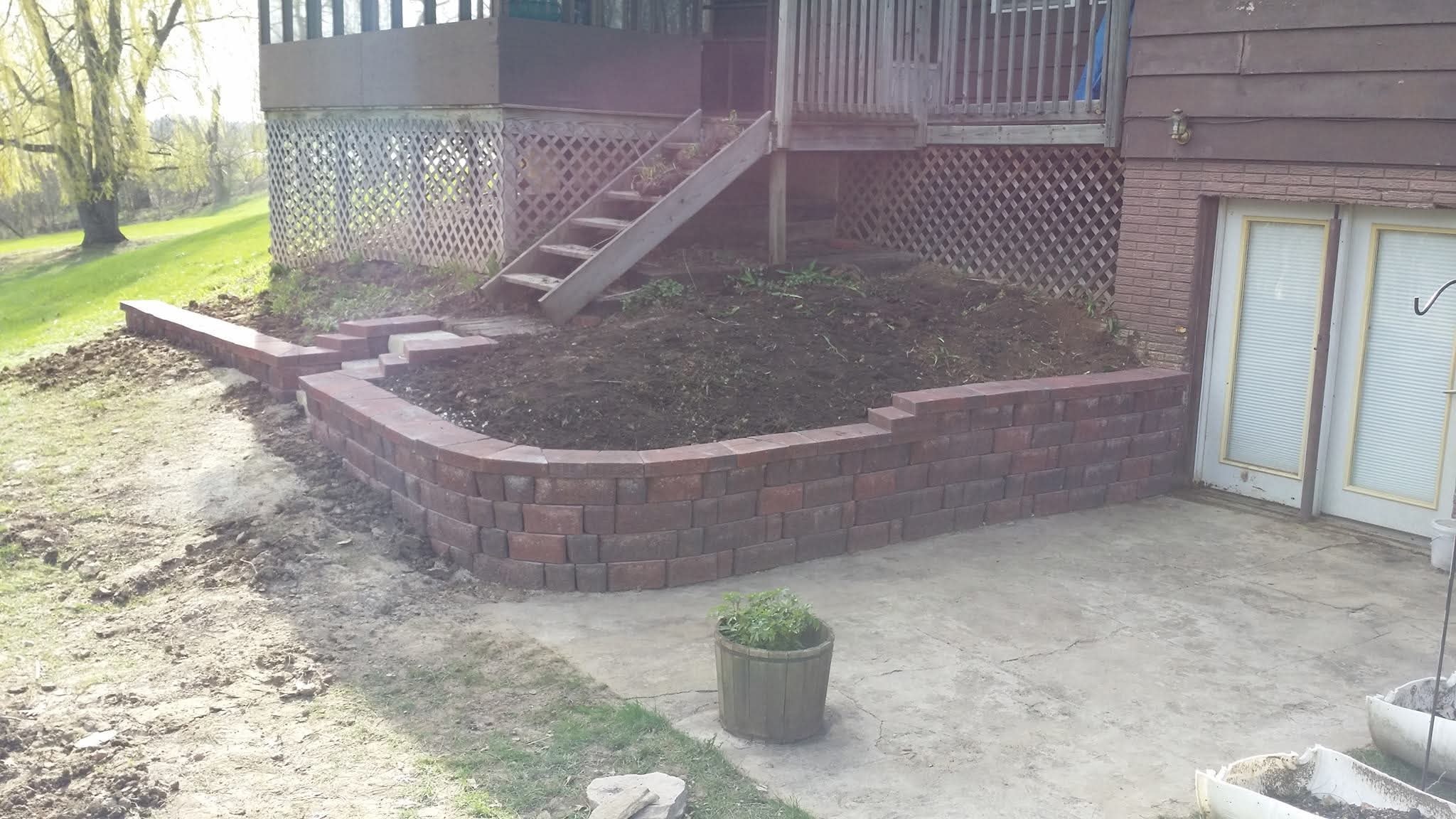 Brick raised garden bed and patio